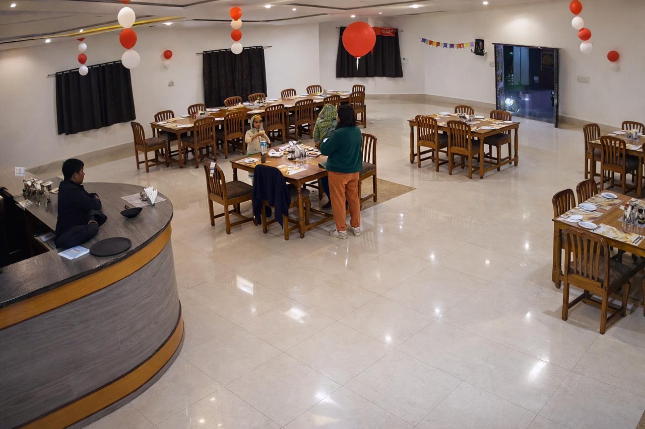 Indoor dining hall at Nature's Lap Resort